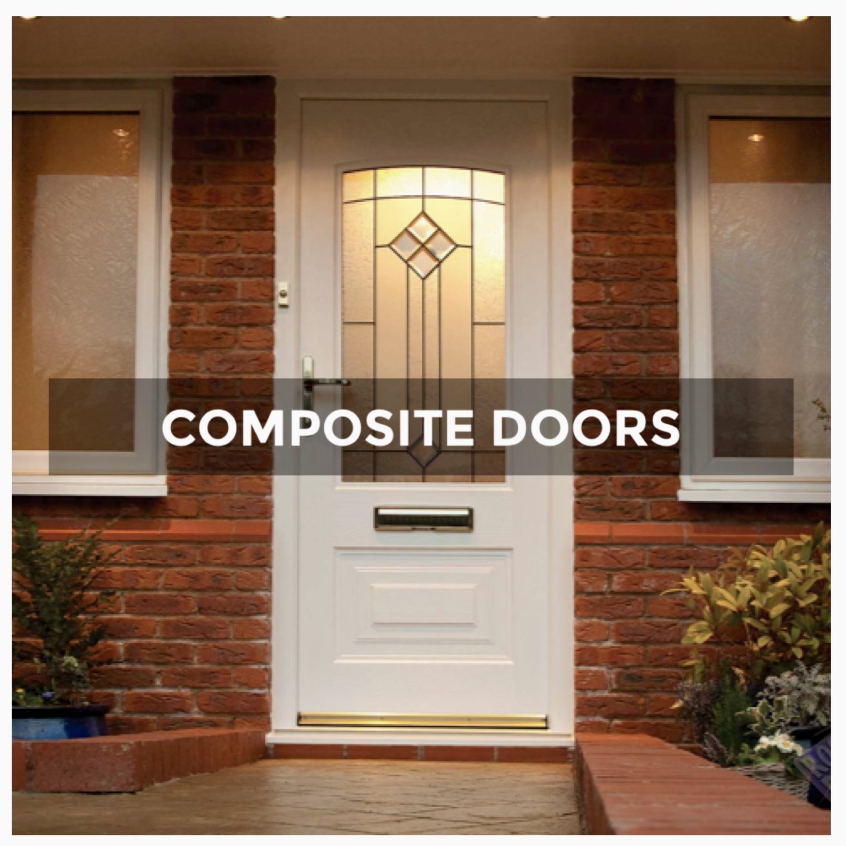 White composite doors at the front of a house